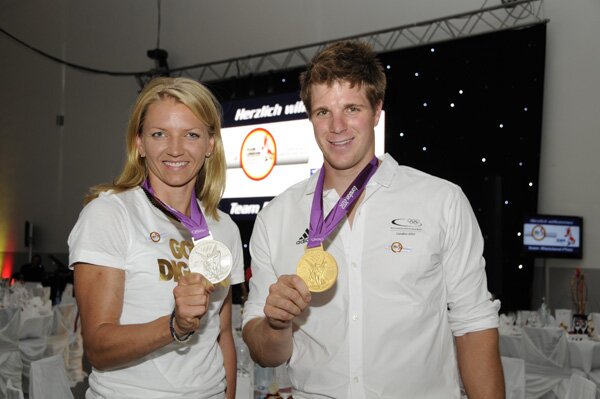 Zwei von fünf rheinland-pfälzischen Medaillengewinnern: Siebenkämpferin Lilli Schwarzkopf und Richard Schmidt, Goldmedaillengewinner im Deutschland-Achter. 2012_olympiaempfang